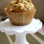Banana nut muffin on a mini cupcake stand.