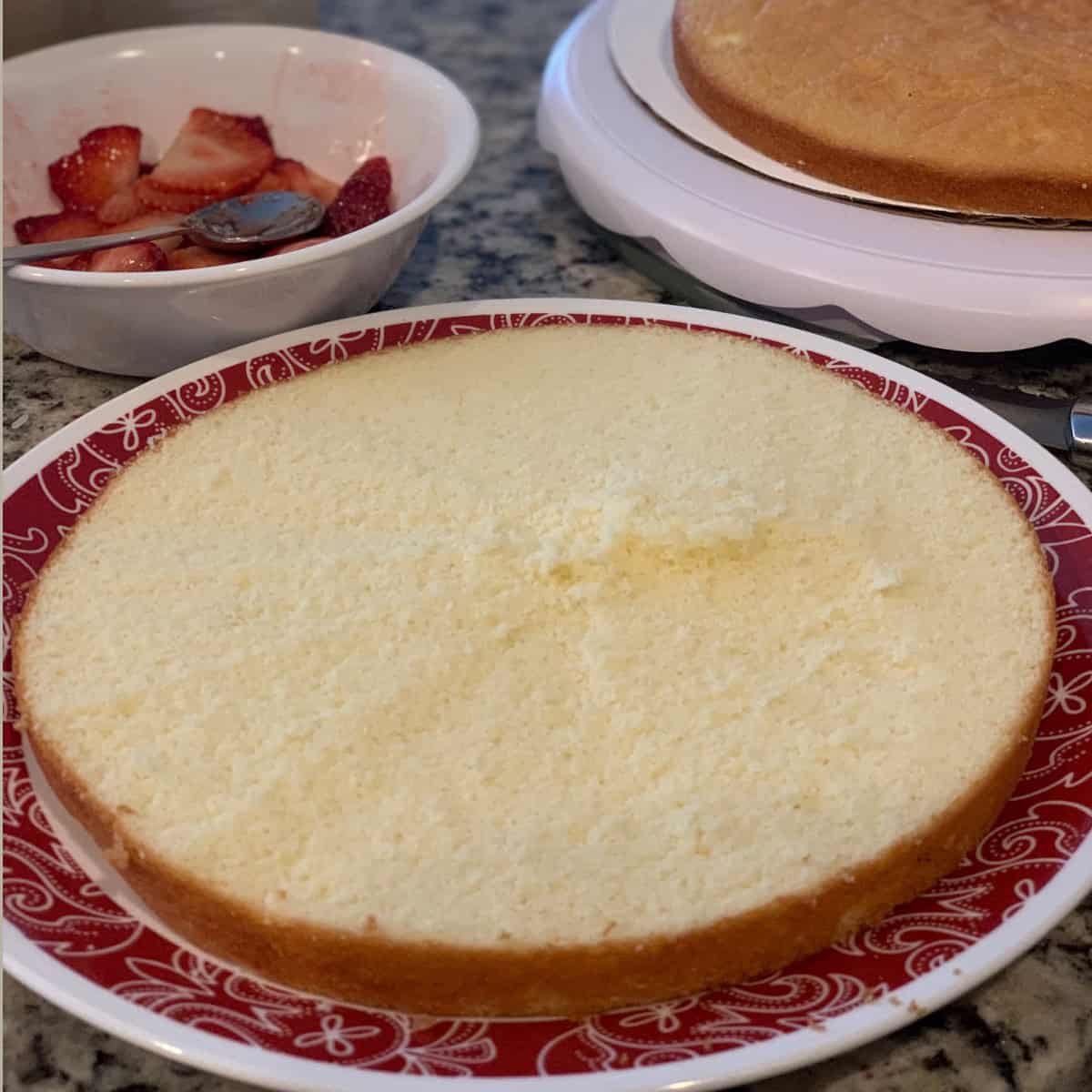 Sliced cake in a plate ready to be frosted.