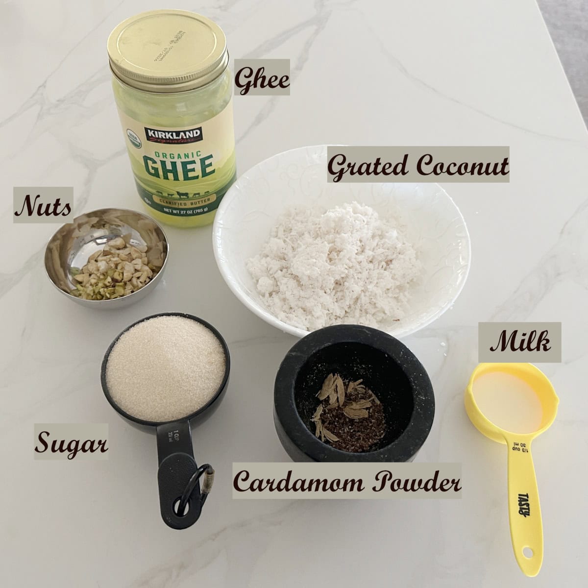 Ingredients for coconut burfi using coconut burfi recipe.