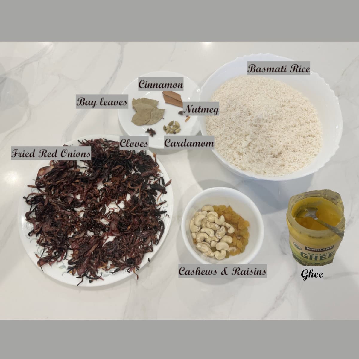 Nei Choru (Easy Ghee Rice ) ingredients displayed on the counter.