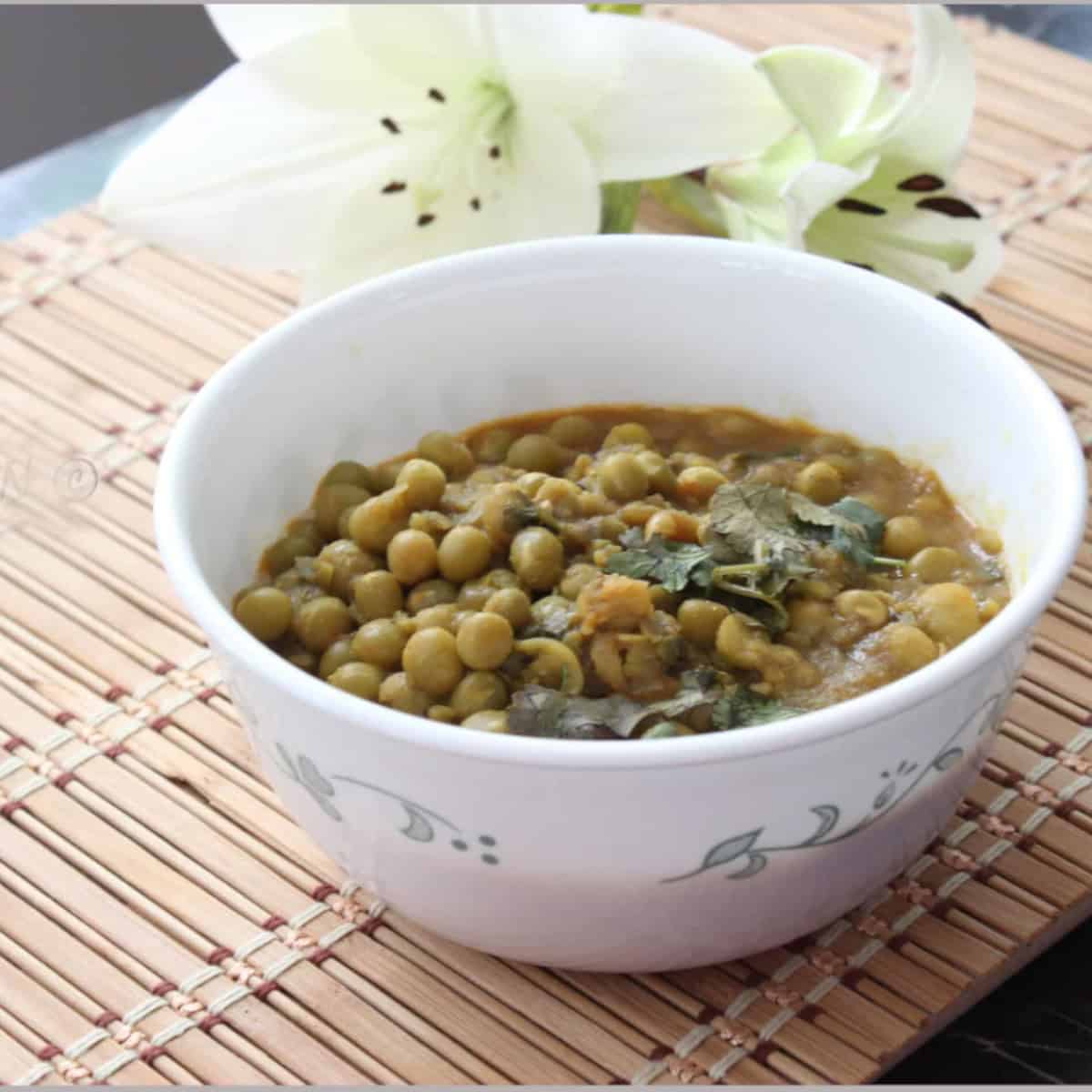 Dry Green Peas Curry in a white bowl.