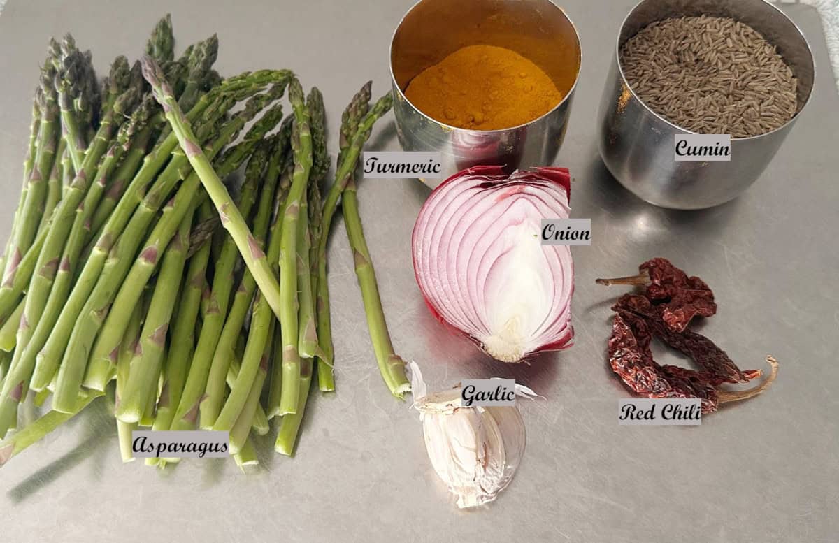 Ingredients to make asparagus stir fry on the counter.
