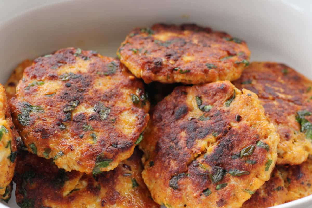 minced chicken patty in a white casserole.