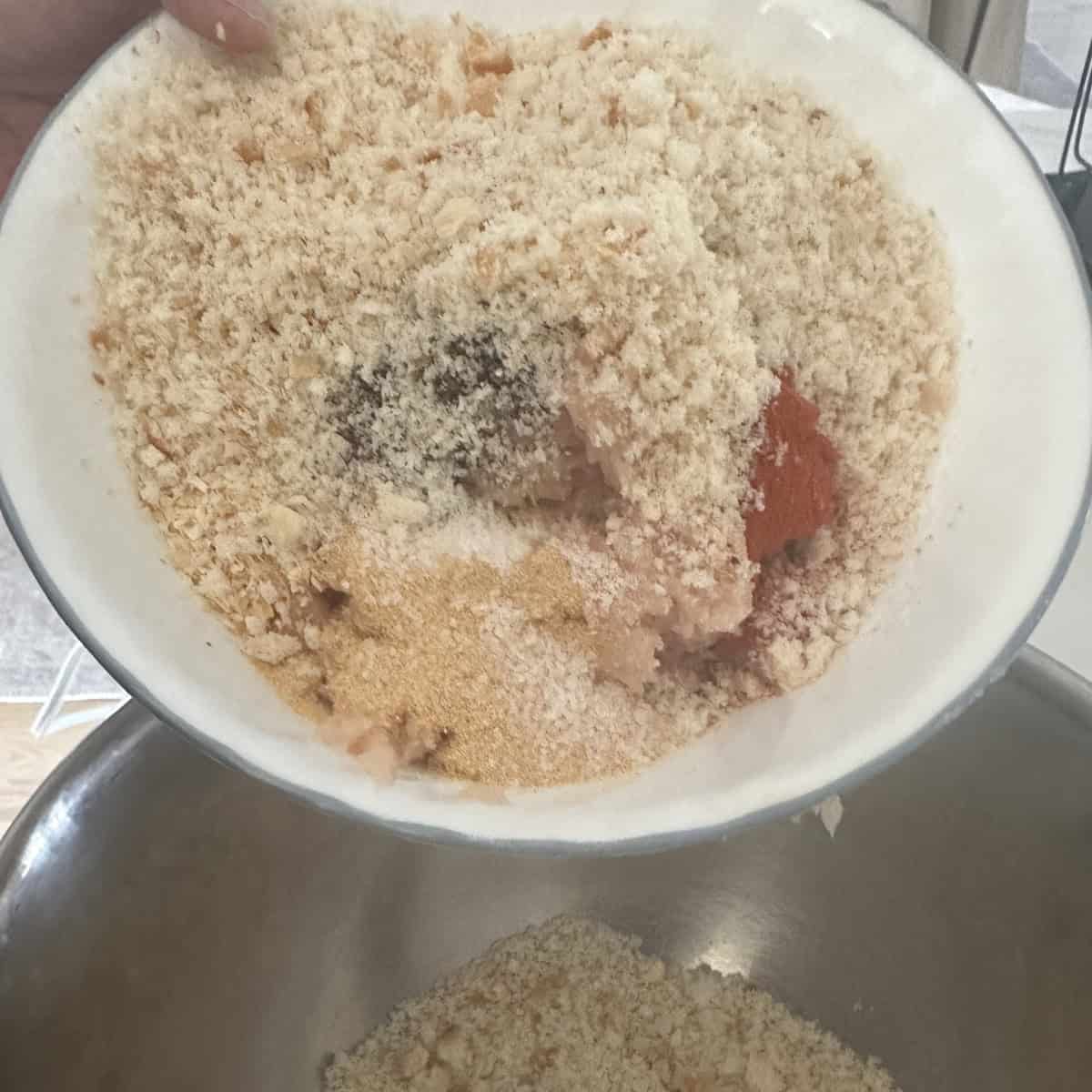 Add breadcrumbs to the minced chicken.