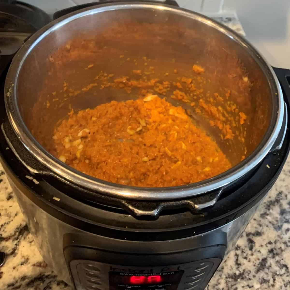carrot halwa in instant pot cooking.