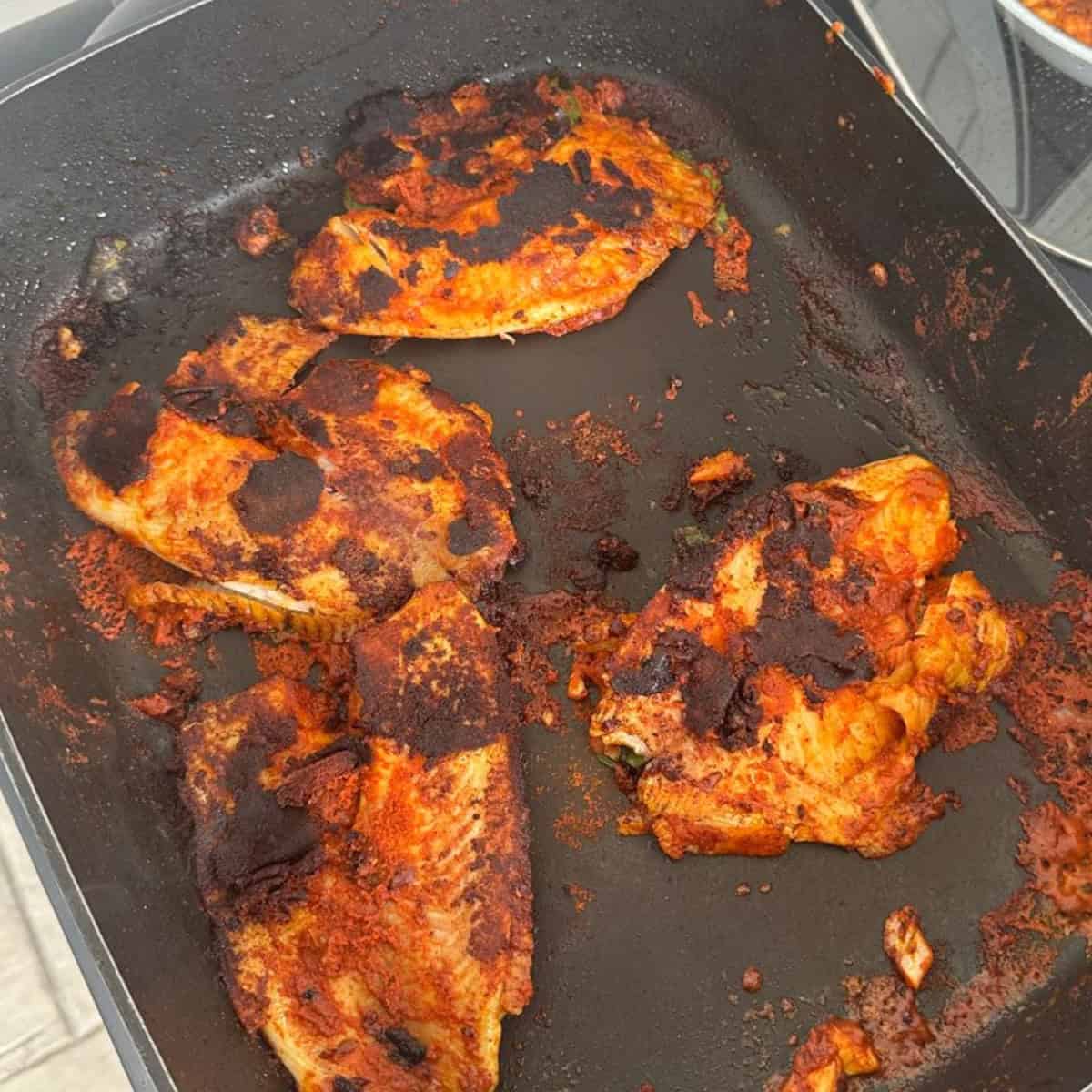 pan-fried Tilapia cooked in an electric fryer.