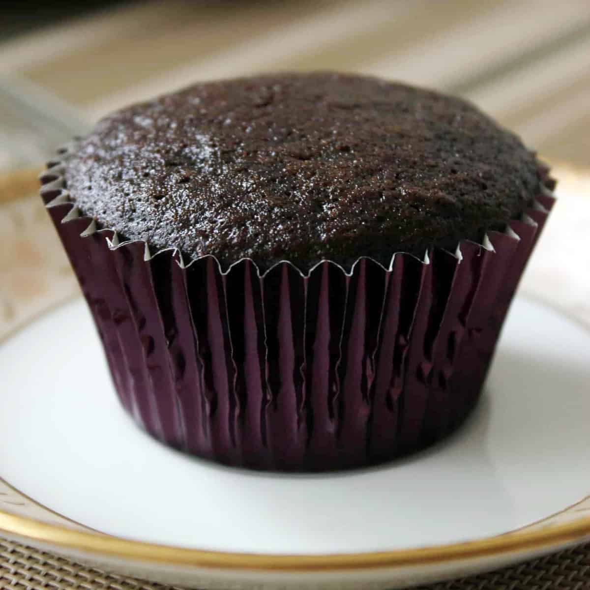 one of the Best Chocolate Cupcakes served in a china plate.