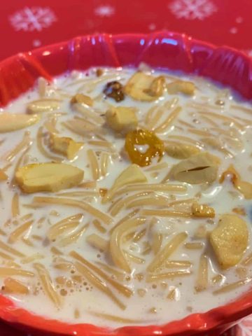 Vemicelli payasam served in a pink bowl with a stainless steel spoon.