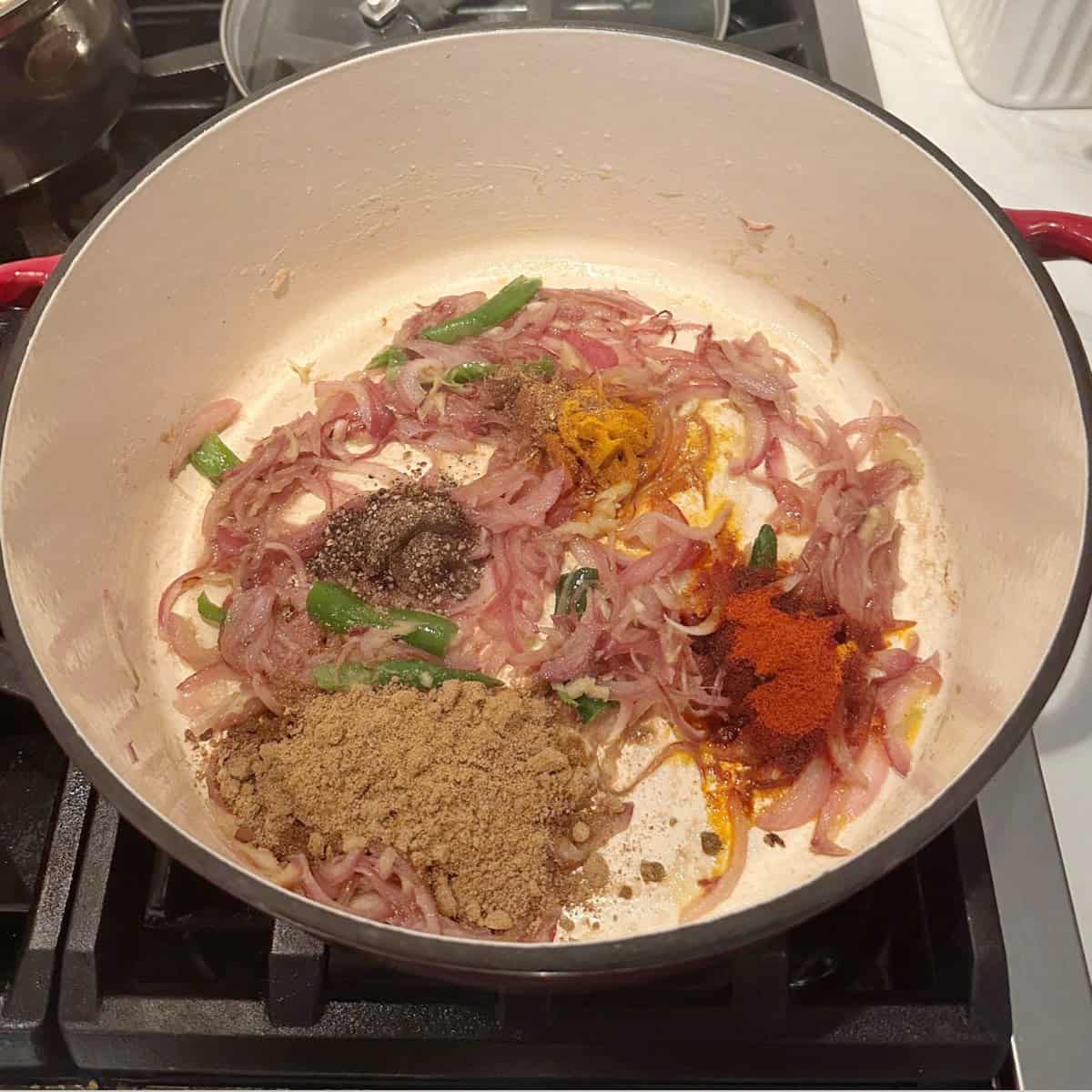 spices added to crab curry prepartaion in an instant pot.