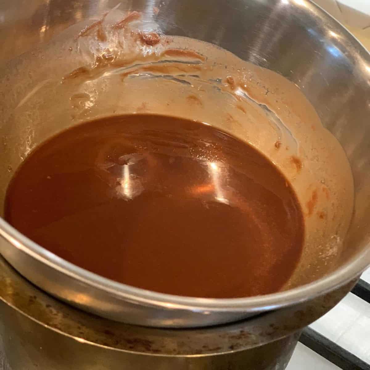 hot choco cake batter being cooked on a boiler.