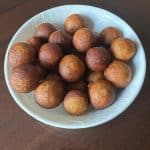 Unniappam made with unniappam recipe that is instant, soft and no -fail served in a white bowl.