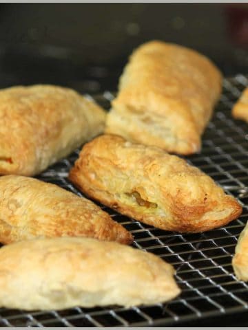 vegetable puffs on a cooling rack.
