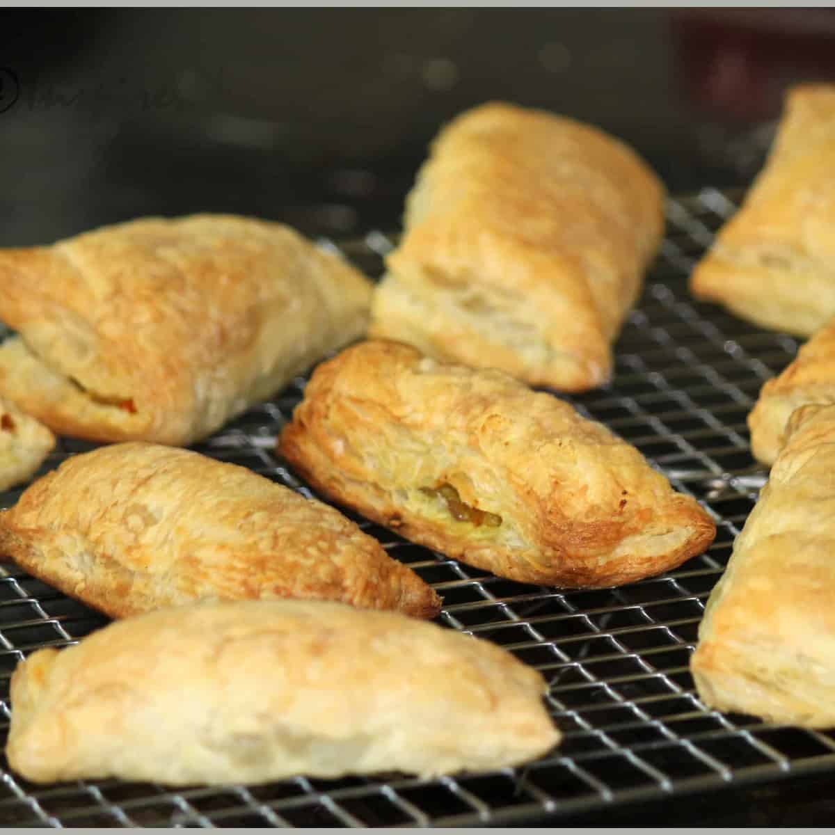 vegetable puffs on a cooling rack.