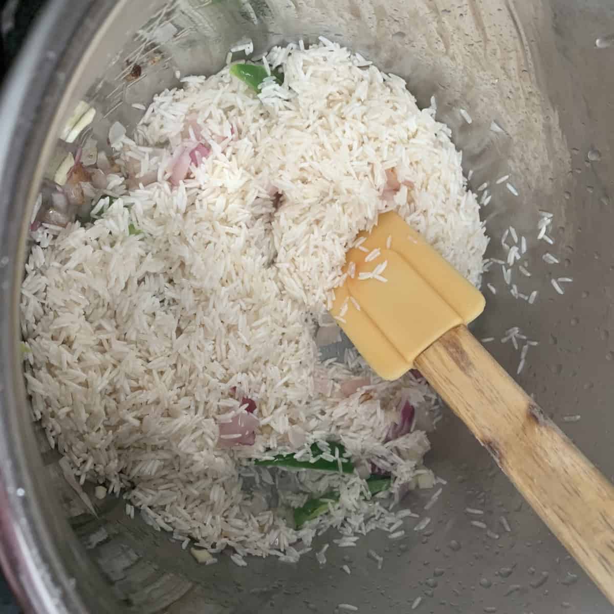 sauteeing rice and veggies.