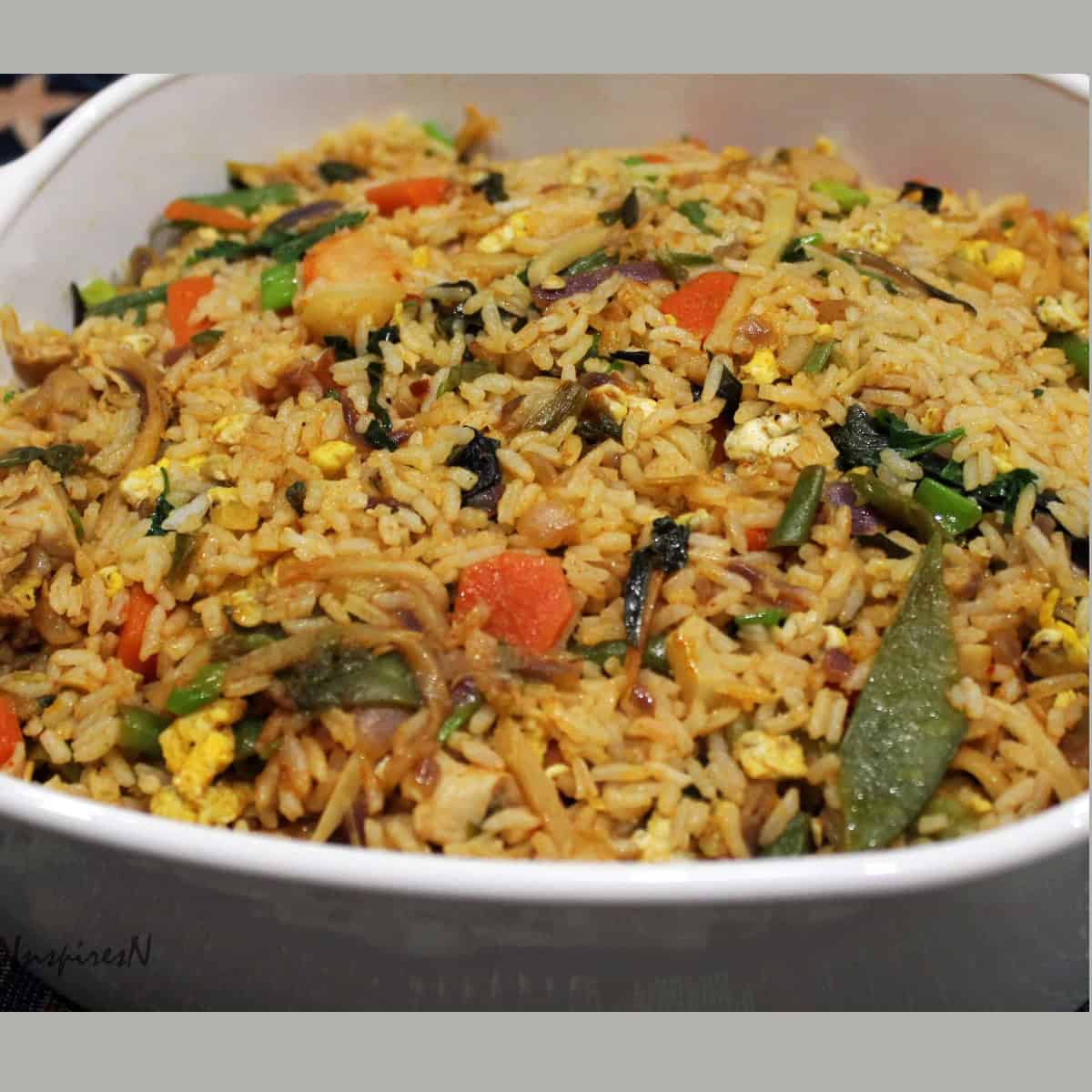Thai Basil Chicken Fried Rice served in a white casserole.
