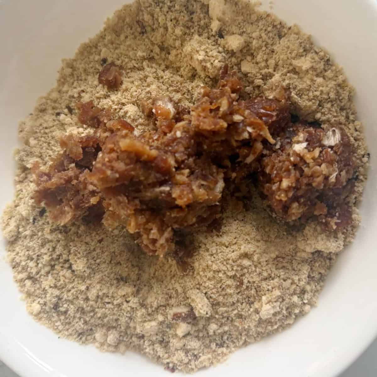 ground dates added to protein (nuts)powder mixture.